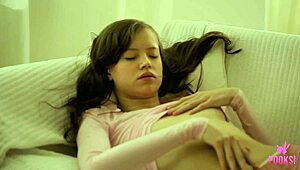 Lynn Strips Naked And Rams A Glass Dildo Deep In Her Dripping Cunt