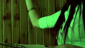 Mira Sunset casually gives a blowjob through the sauna's glory hole