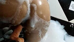 hot brunette gaucha masturbates in motel bathtub with giant dildo orgasm