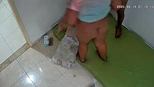 Hidden camera catches wife cheating with neighbor, humiliating husband.