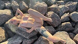 Ever seen a hot exhibitionist play with her clit on the beach?