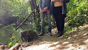 This mature mother-in-law gives an amazing handjob outdoors