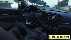 sexy asian hottie plays with natural big boobs in car