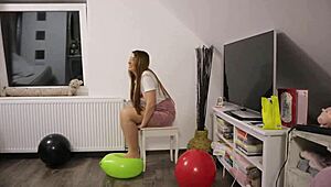 Girl plays with balloons in pantyhose
