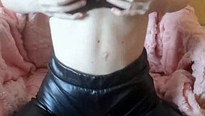 Bold ebony whore fingers her pussy while bound in bondage