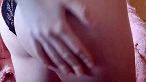 Bold ebony whore fingers her pussy while bound in bondage