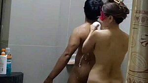 mature milf bathes young guy then they fuck on bed, her big tits bouncing wildly 😏