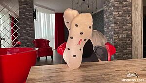 Goddess Plays with Feet in Socks and Barefoot Under Table
