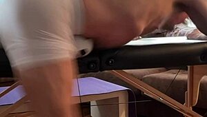 groin stretch in tight spandex shorts with mini soccer ball slowed down