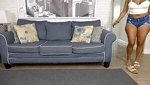 Porsha Carrera Handling a Large Item