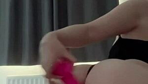 British girl enjoys solo toy play