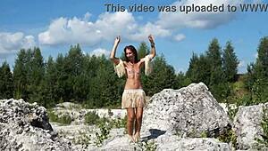 Topless dance in white stone quarry?