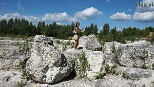 Topless dance in white stone quarry?
