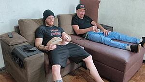 Intense feelings surge as I masturbate with my stepson, our big cocks throbbing together.