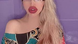 Blonde Woman With Long Hair And Nails In Fetish Scene