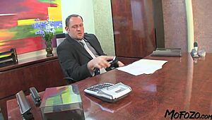 Tanned secretary receives intense cumshot on her big tits from boss