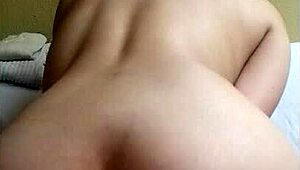 amateur sits on dildo for anal play