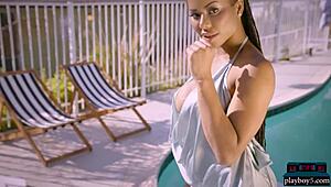 Ebony Kira Noir is a black milf with big tits and ass exposed by Playboy