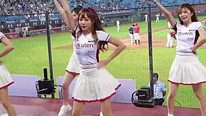 Cheerleaders dancing for baseball game