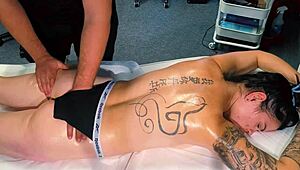 male masseur gives massage to tattoo girl but she wanted more and he gave it