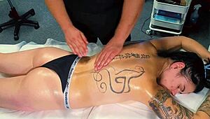 male masseur gives massage to tattoo girl but she wanted more and he gave it