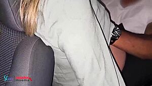 The husband watches his wife mingle at the group gathering in the car