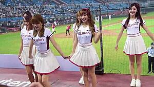Cheerleaders dancing for baseball game