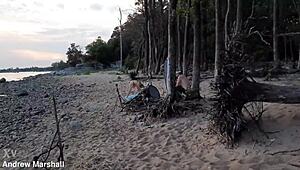 Intense beach orgy with young teens and shaved pussies