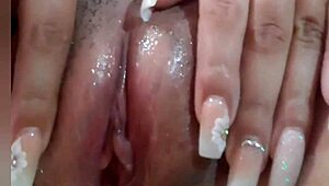 Why won't this loud music let me hear the skinny girl's moans as she touches her pink pussy?