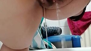 Close-Up of Girlfriend Pissing from Behind in Doggystyle