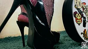 Rocker passionately caresses her wet pussy with vibrator and butt plug