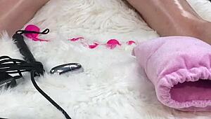 I massaged her oiled body, then fucked her pussy and asshole hard with a glass dildo. She loved it and went home to her husband swollen