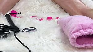 I massaged her oiled body, then fucked her pussy and asshole hard with a glass dildo. She loved it and went home to her husband swollen