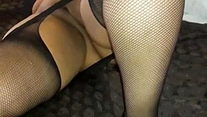 Look at Beruka, my horny wife, displaying her wet, shaved pussy in open fishnets
