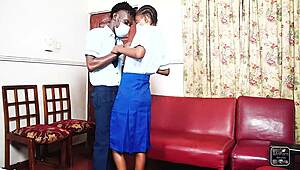 Two students engage in heated session in staff office post-school.