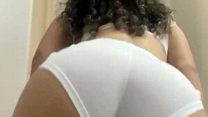 the hot girl dances funk in white see-through shorts