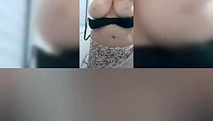 mature milf masturbates her big pussy and swings tits