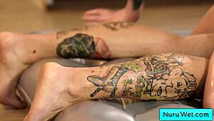 whoa, teen brunette masseuse drenches her naked body in nuru gel 😍