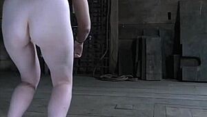 Bound sub writhes from stinging cane then massive dildo invasion