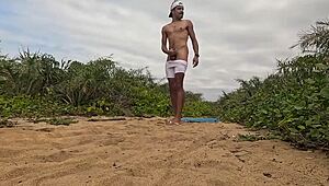 Intriguing african beach handjob ends in massive cumshot explosion