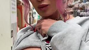 hey, check out this busty babe flashing pierced tits everywhere in the store