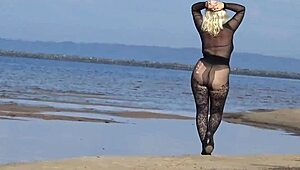 mature blonde teases big tits and ass flashing naturally on beach