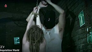 interrogates cute hairy dreadgirl in prison bondage with cigarettes