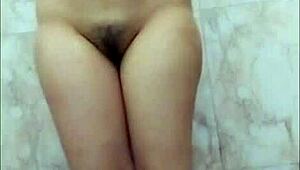 Hot Indian girl fingers wet pussy in bathroom with dirty Hindi sex talk