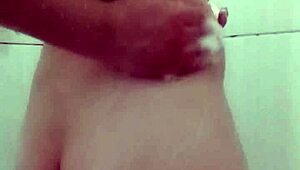 Young 18+ Amateur Girl Lathers Naked Body in Hot Shower