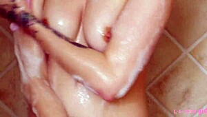 gorgeous blonde steps into steamy shower for total refresh