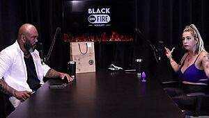 In jail, the bandit's wife Julia Fontanelli straps into special seat on sheer red for public watch.