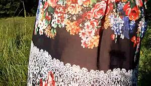 Hairy chubby mature flashes wet beaver under skirt on public nudist beach