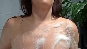 check out this curvy housewife getting dirty and wet in the bath tub