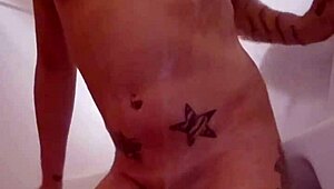 emy angel soaps her petite tits ass and pussy in steamy shower